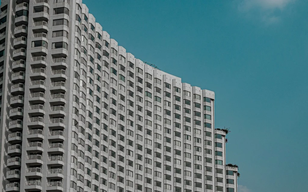 white concrete building under blue sky during daytime