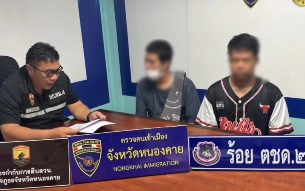 Immigration officer with two blurred suspects