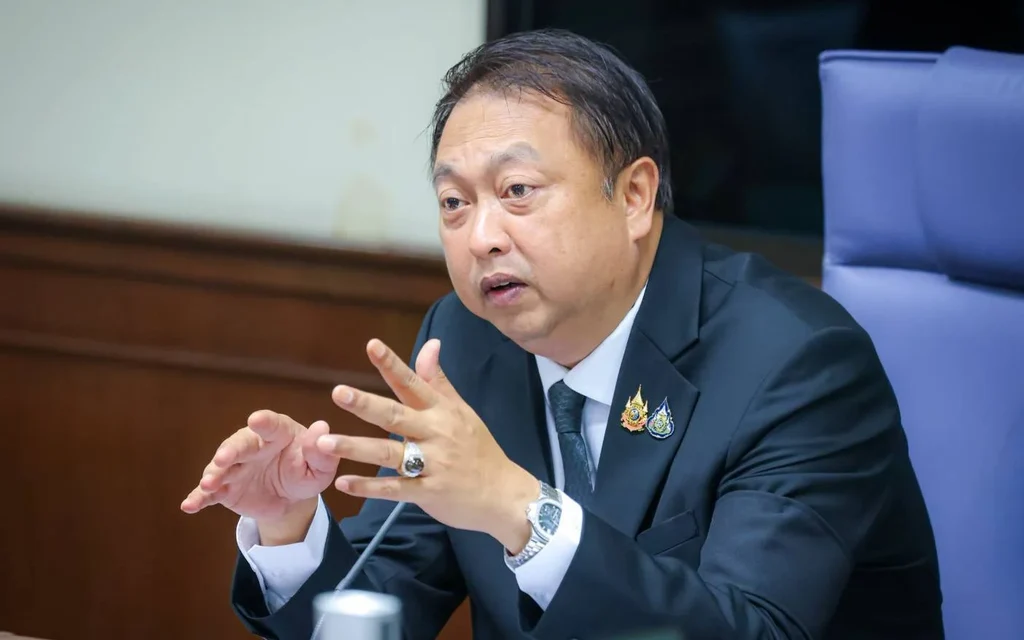 A Thai government official speaking at a meeting.
