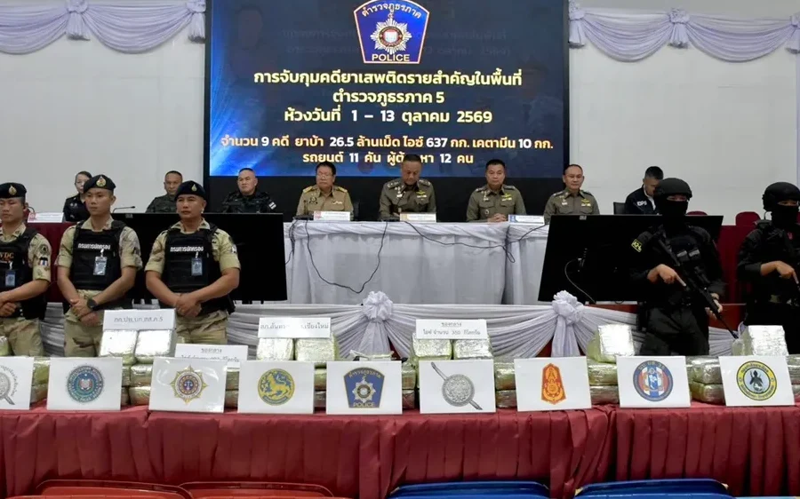 Police officers at a press conference with seized drugs.