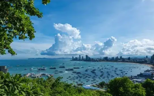 A scenic view of Pattaya bay and city skyline.