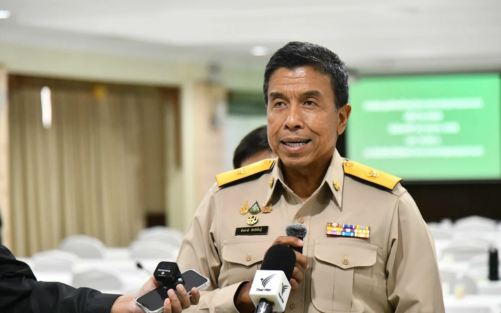 Bangkok official speaks to reporters at a press conference.
