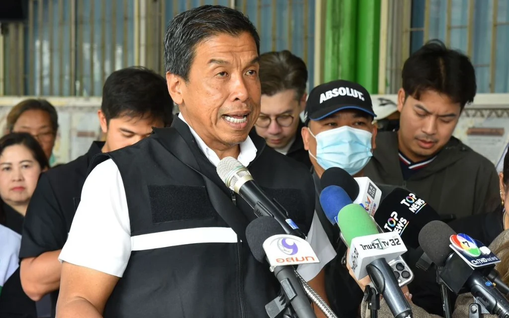 Bangkok Governor Chadchart Sittipunt speaking to reporters at a press conference.