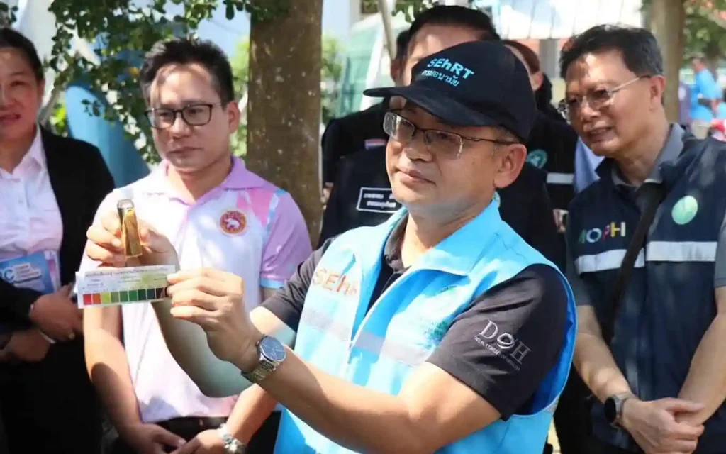 Health officials demonstrating a water quality test kit in Chiang Rai.