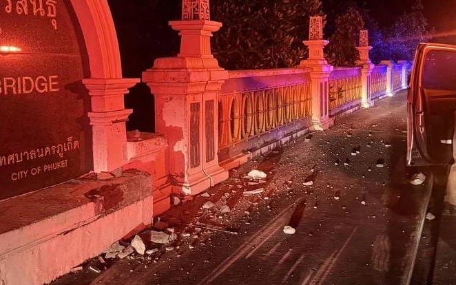 Night scene at a bridge in Phuket after a traffic accident.