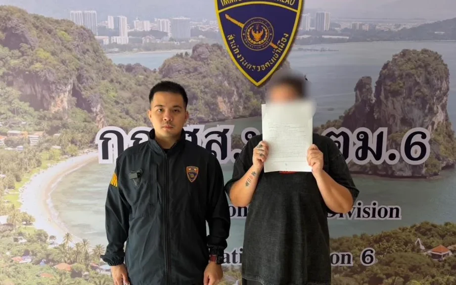 Immigration officer standing next to a suspect with a blurred face.
