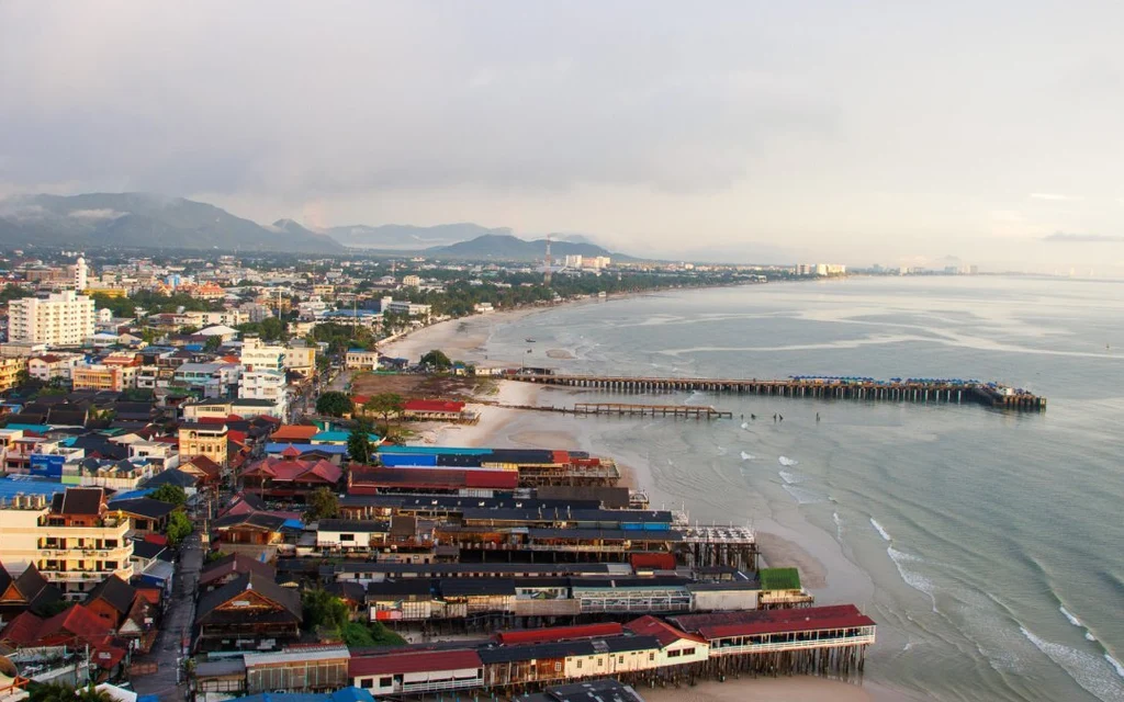 Aerial view of Hua Hin beachfront buildings and coastline.
