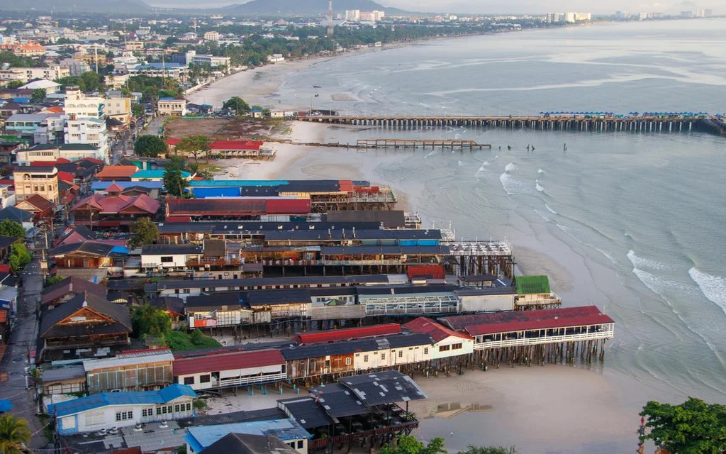 Aerial view of beachfront buildings and shoreline in Hua Hin.