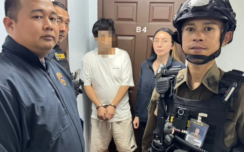 Immigration police with a man in a room.