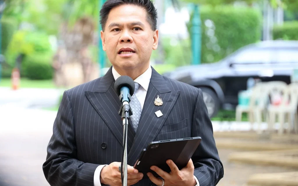 Thai Industry Minister speaking to the press.