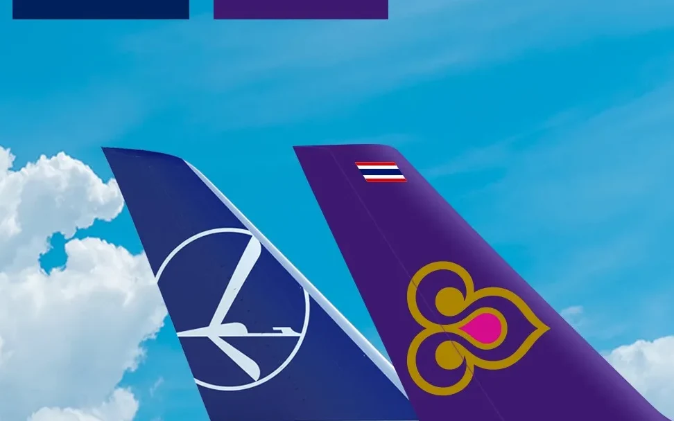 Tails of LOT and Thai Airways airplanes.